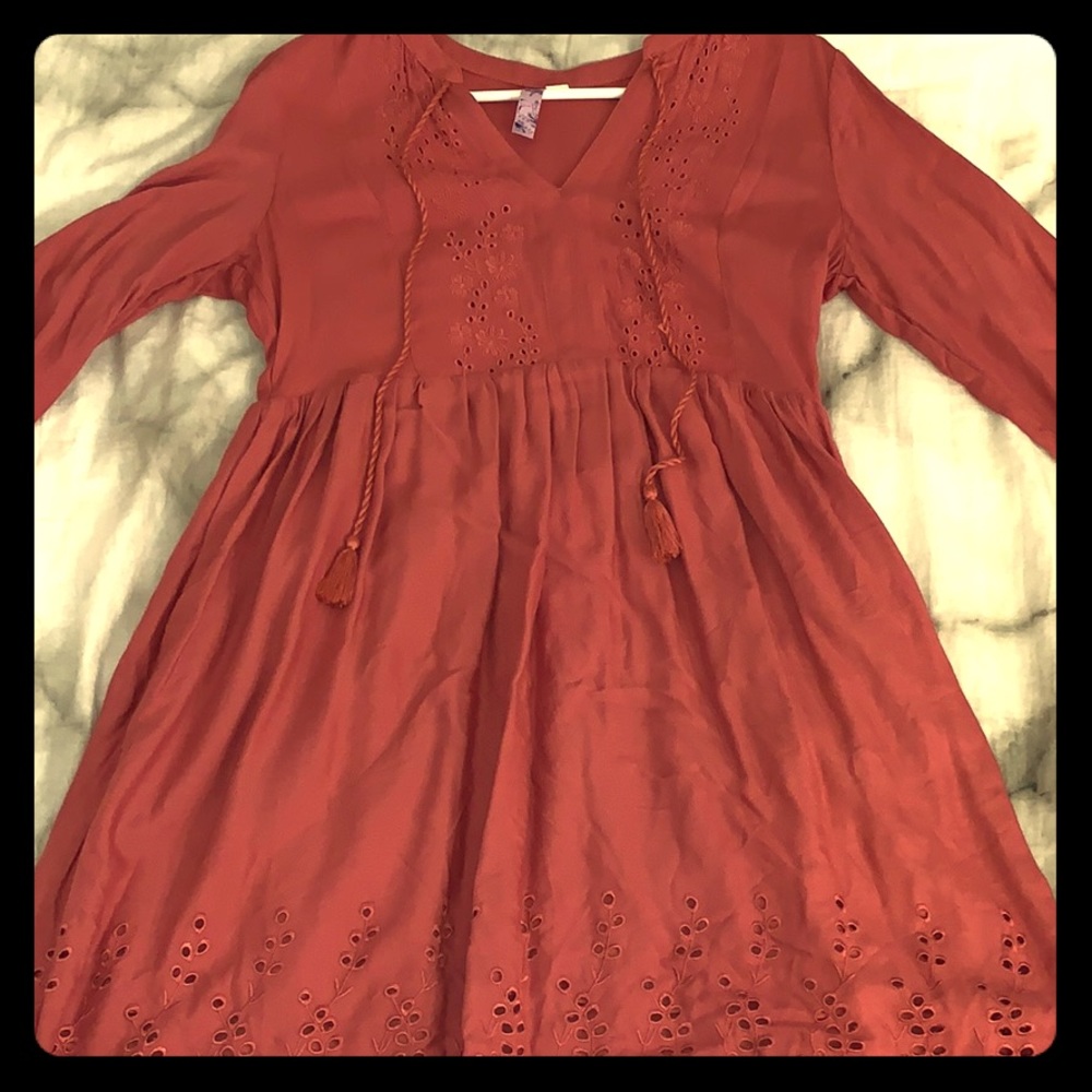 A mauve knee length (on me, 5”3) . Size Small.